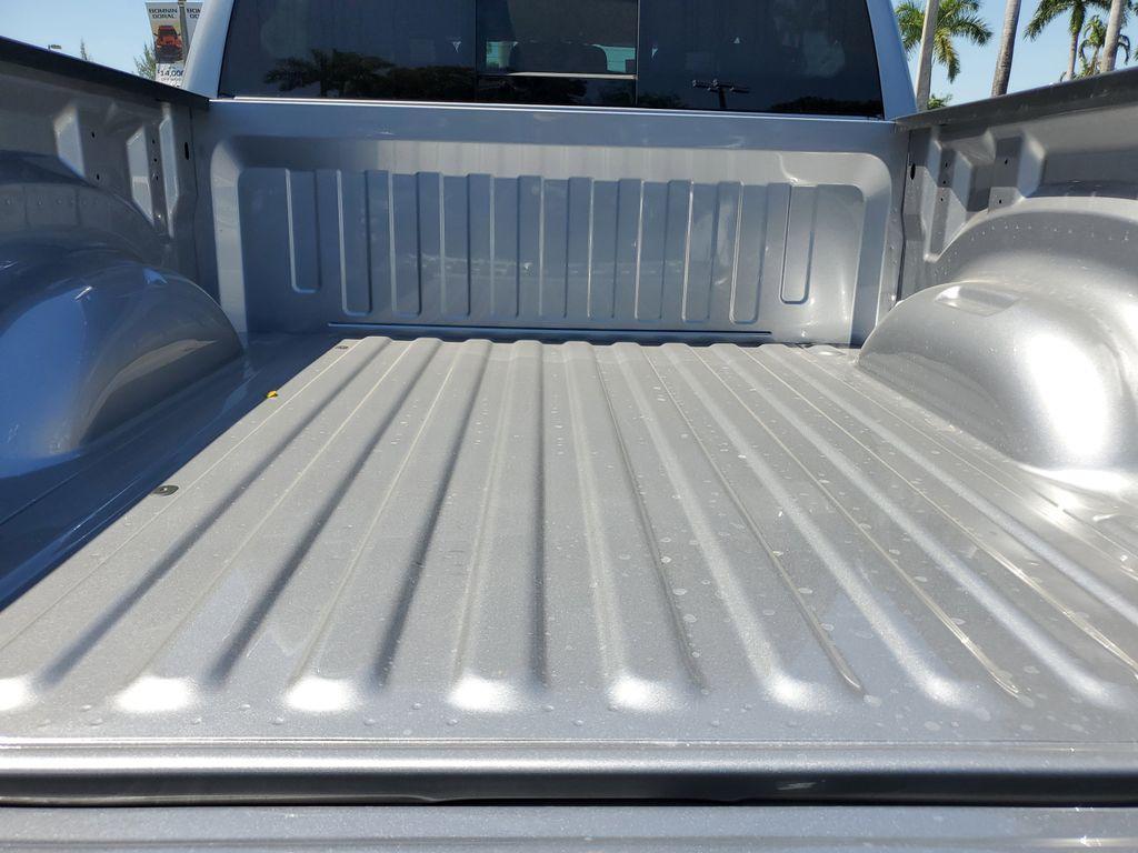 new 2025 Ram 1500 car, priced at $39,057