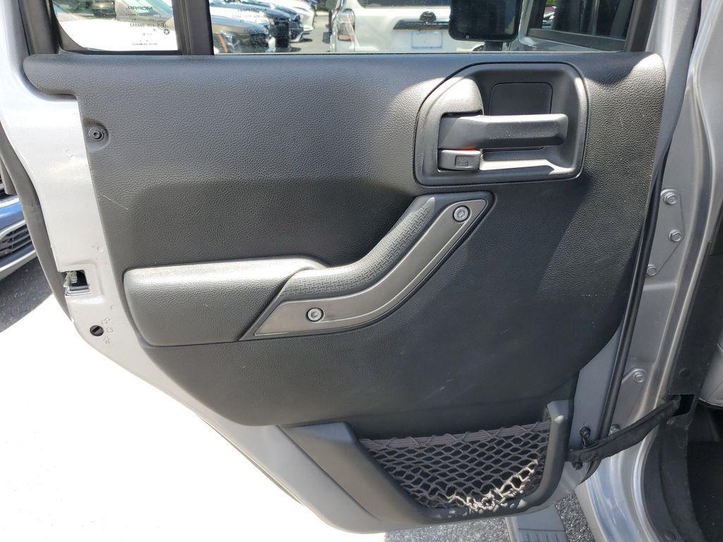 used 2018 Jeep Wrangler JK Unlimited car, priced at $15,390