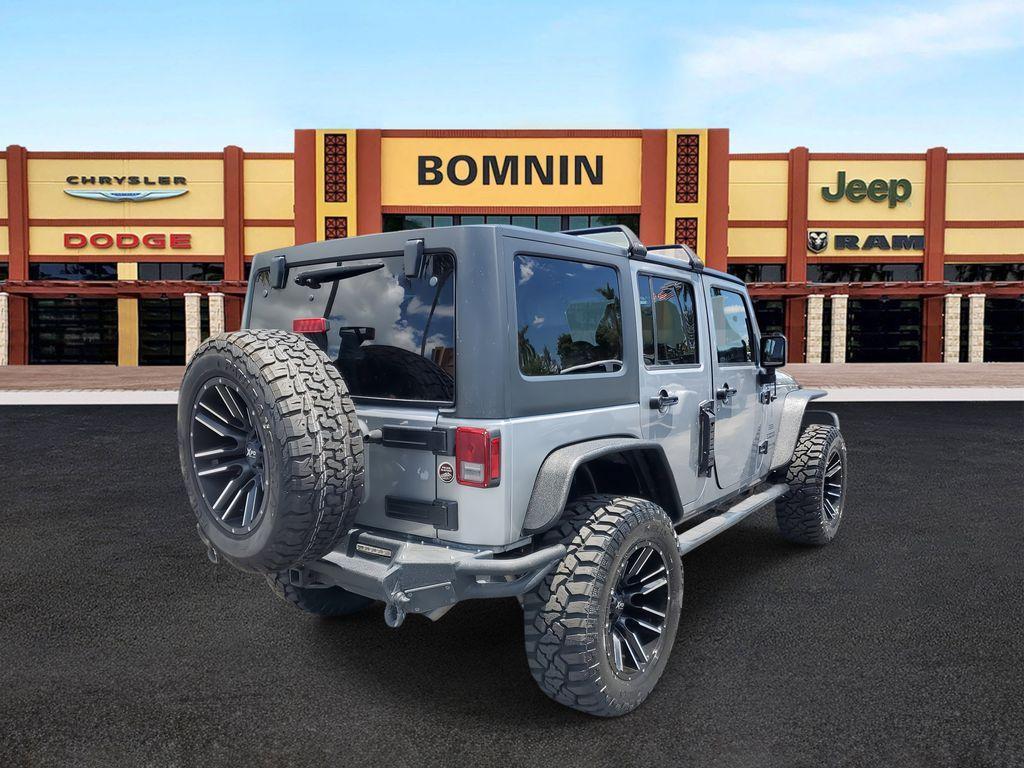 used 2018 Jeep Wrangler JK Unlimited car, priced at $15,390
