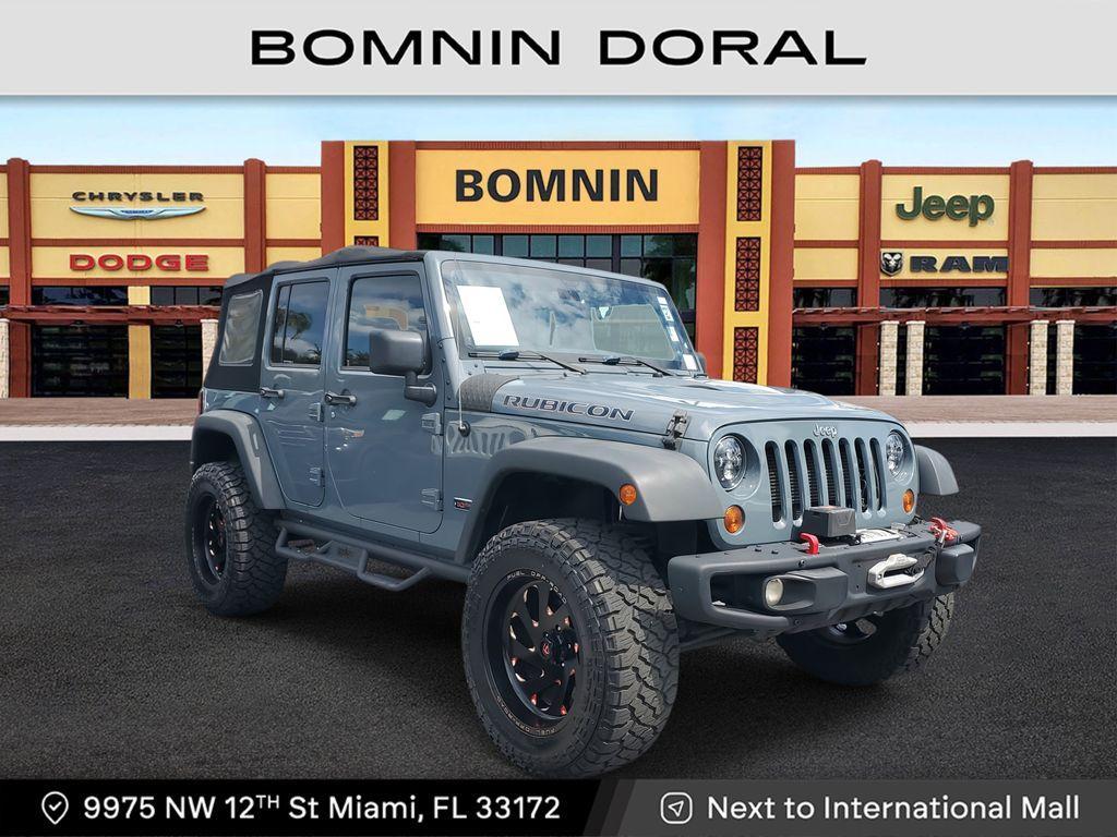 used 2013 Jeep Wrangler Unlimited car, priced at $18,990