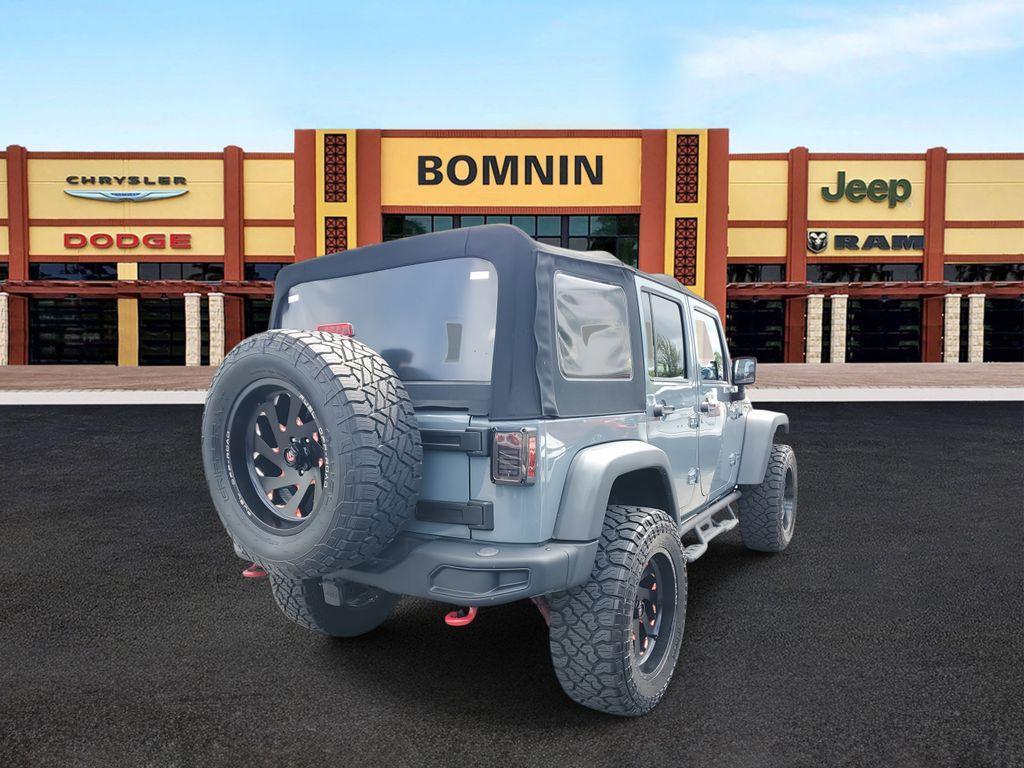 used 2013 Jeep Wrangler Unlimited car, priced at $18,990