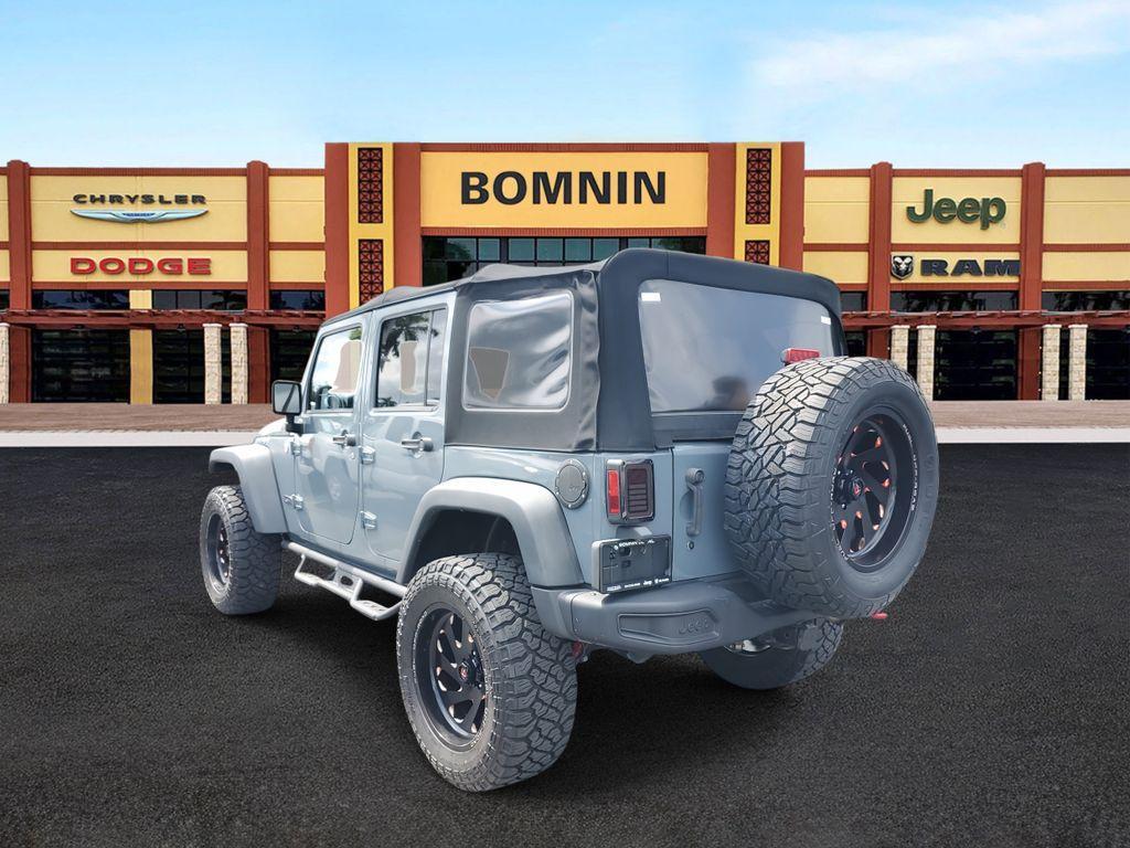 used 2013 Jeep Wrangler Unlimited car, priced at $18,990