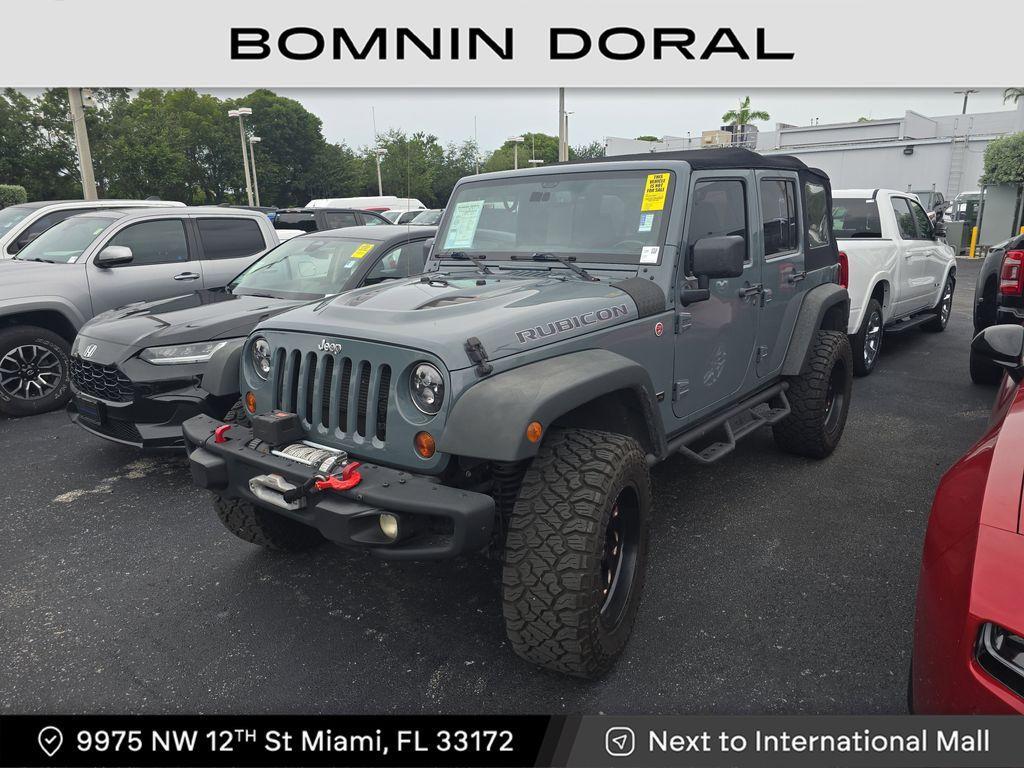 used 2013 Jeep Wrangler Unlimited car, priced at $19,490
