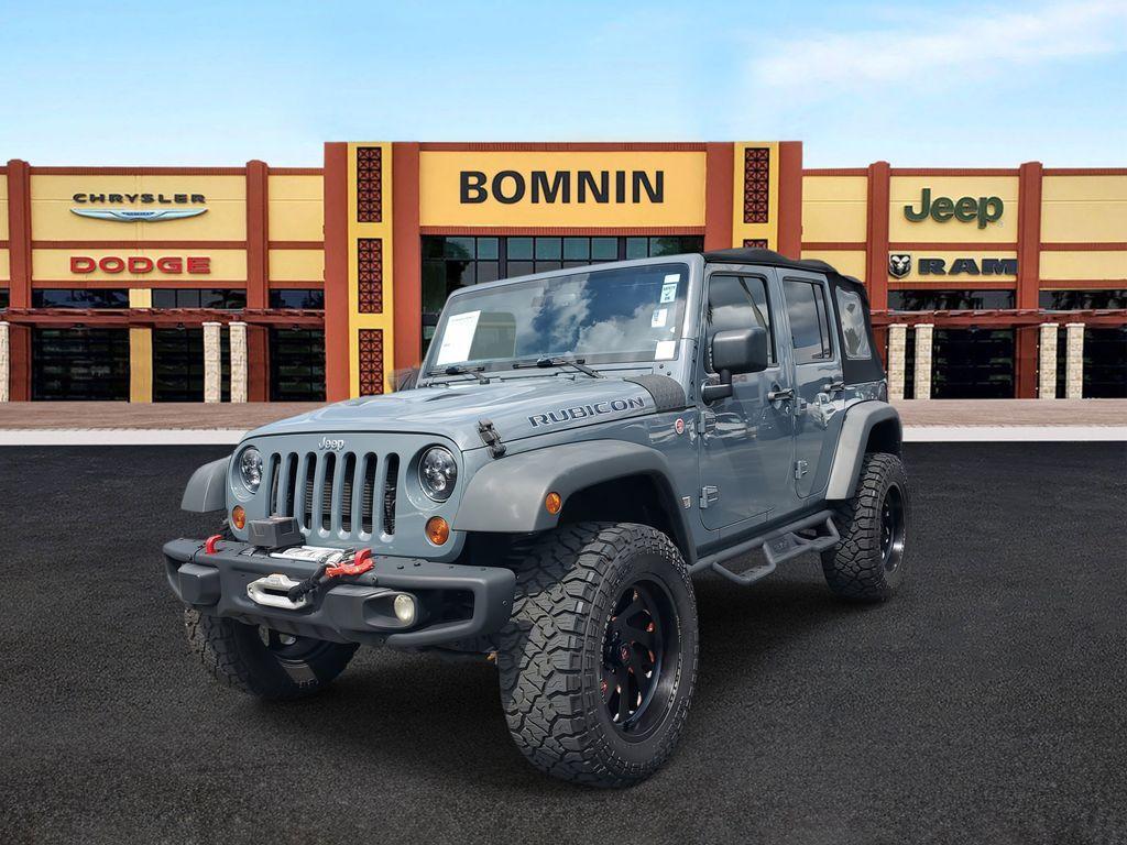 used 2013 Jeep Wrangler Unlimited car, priced at $18,990