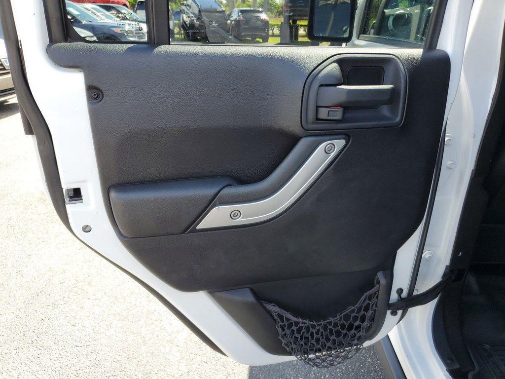 used 2014 Jeep Wrangler Unlimited car, priced at $16,990