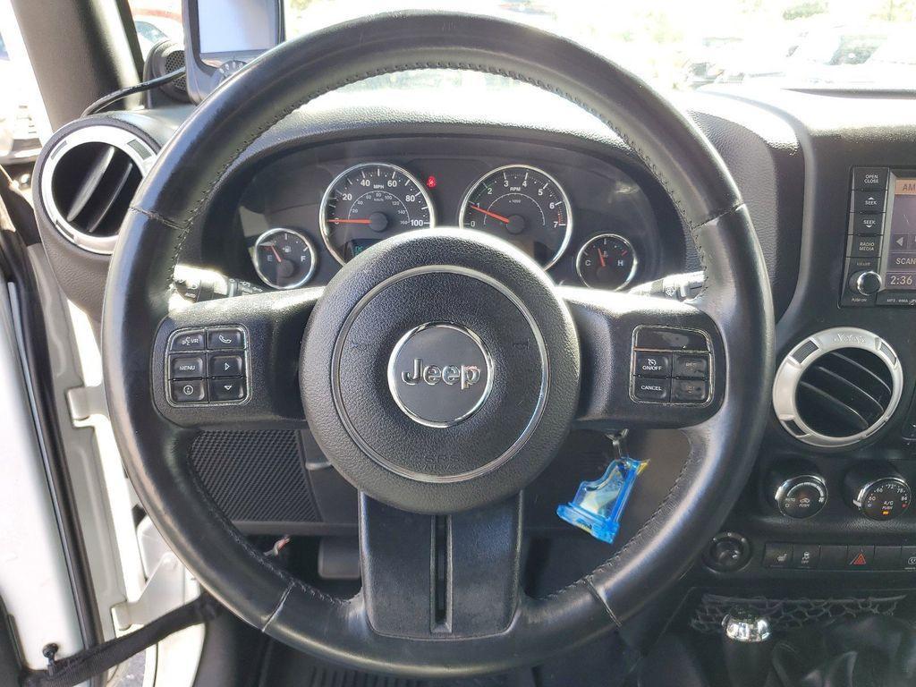 used 2014 Jeep Wrangler Unlimited car, priced at $16,990
