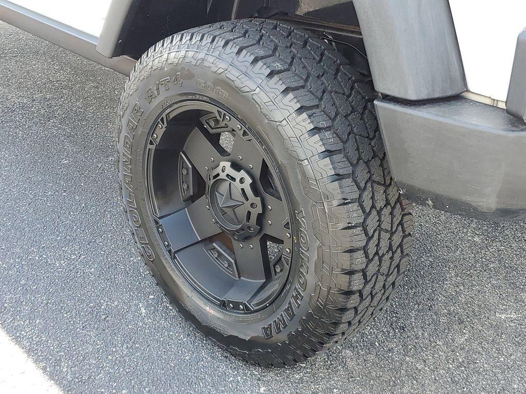 used 2014 Jeep Wrangler Unlimited car, priced at $16,990