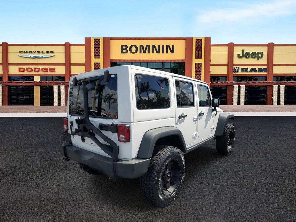 used 2014 Jeep Wrangler Unlimited car, priced at $16,990
