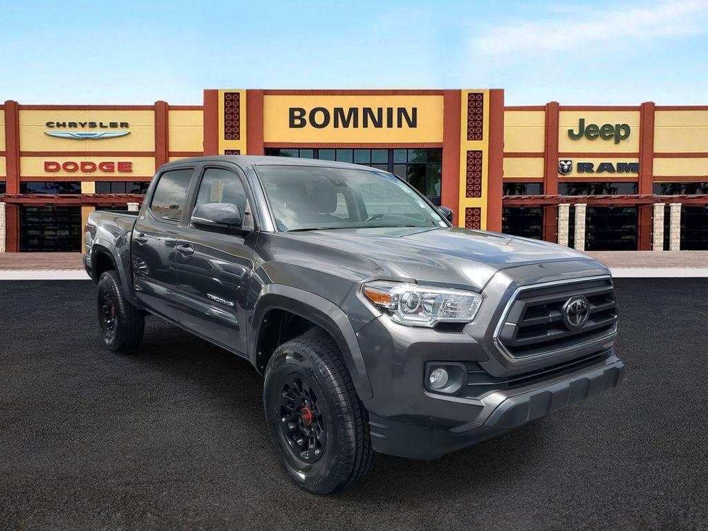 used 2022 Toyota Tacoma car, priced at $25,990