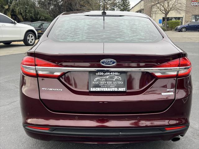 used 2018 Ford Fusion car, priced at $8,999