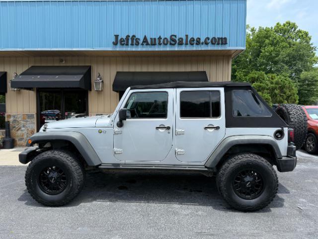 used 2011 Jeep Wrangler Unlimited car, priced at $9,980