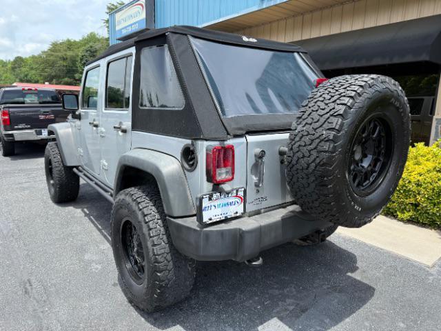 used 2011 Jeep Wrangler Unlimited car, priced at $9,980
