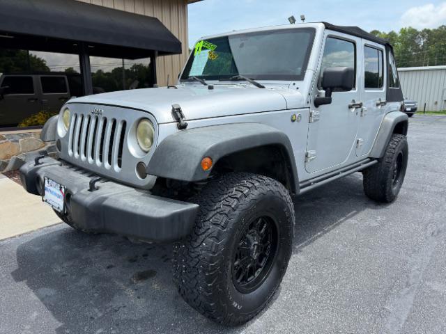 used 2011 Jeep Wrangler Unlimited car, priced at $9,980