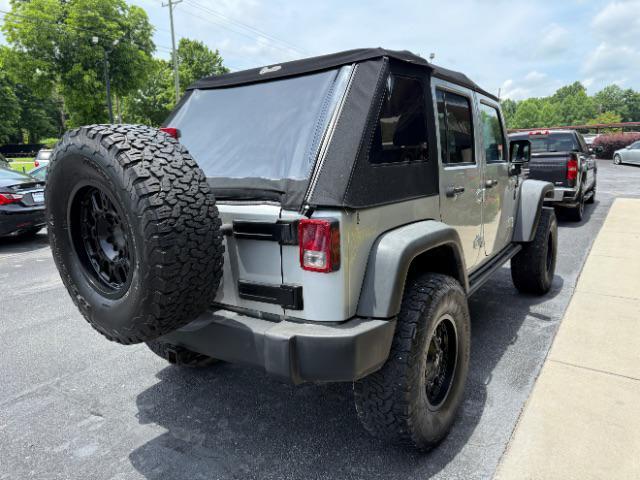 used 2011 Jeep Wrangler Unlimited car, priced at $9,980