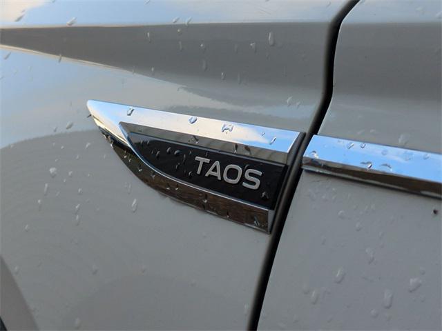 used 2024 Volkswagen Taos car, priced at $19,690
