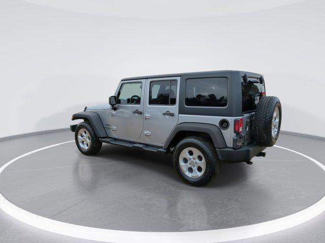 used 2015 Jeep Wrangler Unlimited car, priced at $13,130