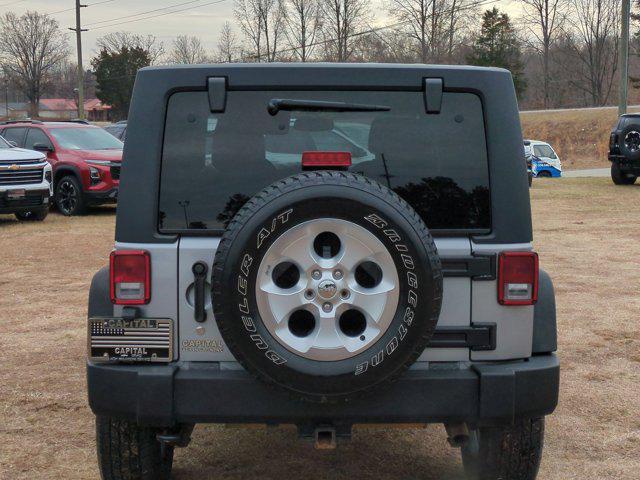 used 2015 Jeep Wrangler Unlimited car, priced at $13,130