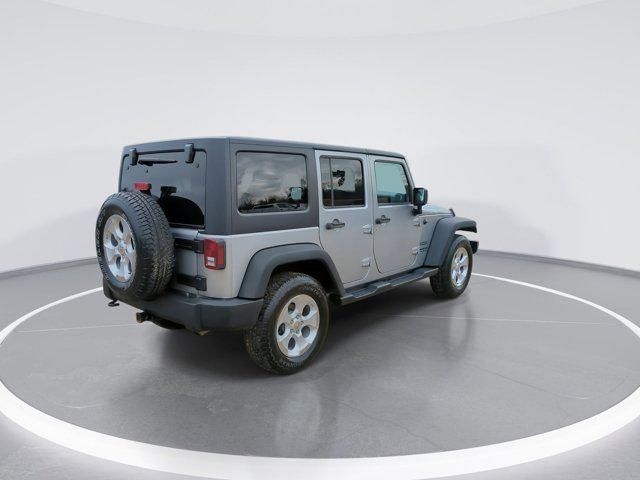 used 2015 Jeep Wrangler Unlimited car, priced at $13,130