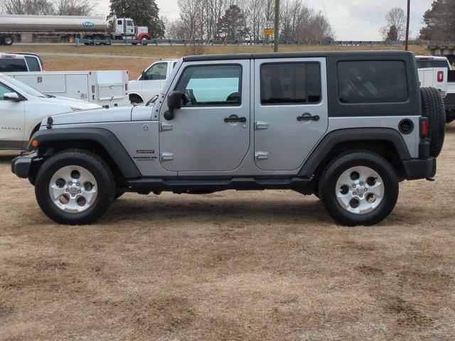 used 2015 Jeep Wrangler Unlimited car, priced at $13,130