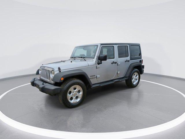 used 2015 Jeep Wrangler Unlimited car, priced at $13,130