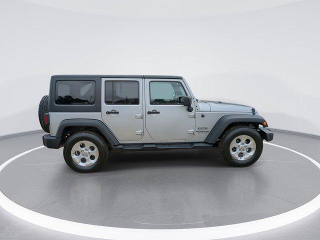 used 2015 Jeep Wrangler Unlimited car, priced at $13,130