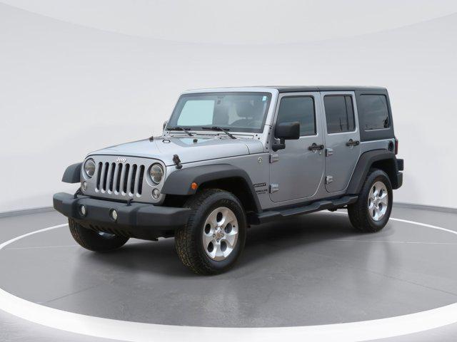 used 2015 Jeep Wrangler Unlimited car, priced at $13,130