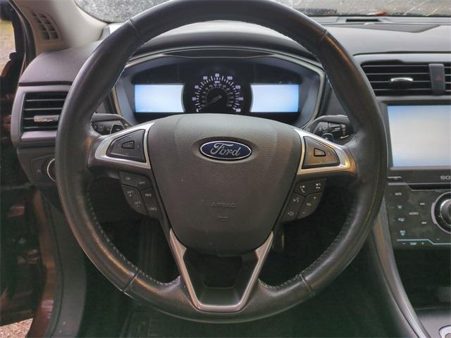 used 2015 Ford Fusion car, priced at $10,140