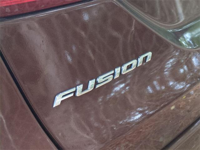 used 2015 Ford Fusion car, priced at $10,140