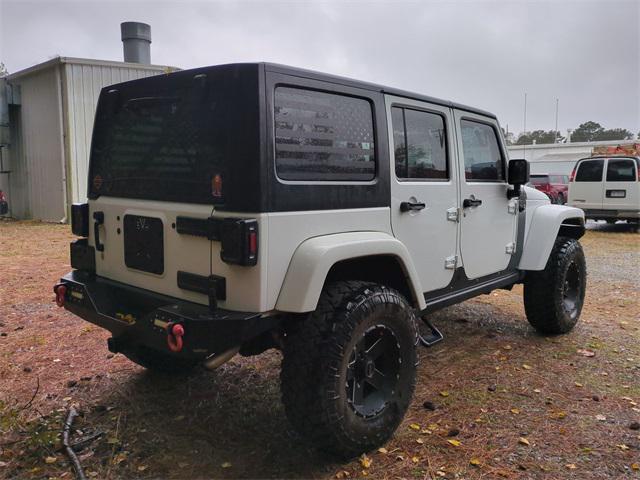 used 2015 Jeep Wrangler Unlimited car, priced at $18,665