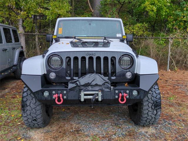used 2015 Jeep Wrangler Unlimited car, priced at $18,665