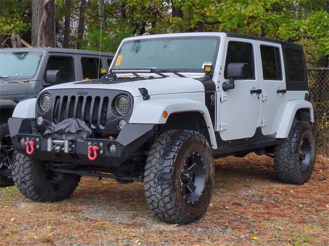 used 2015 Jeep Wrangler Unlimited car, priced at $18,665