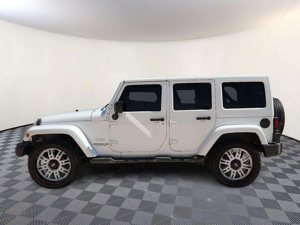 used 2014 Jeep Wrangler Unlimited car, priced at $19,998