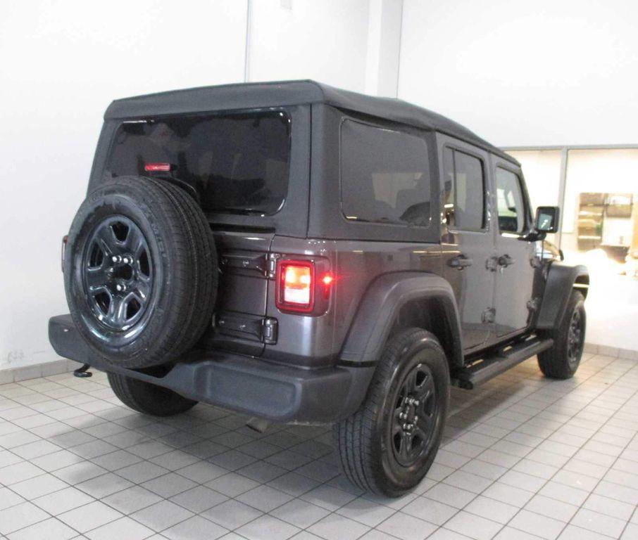 used 2023 Jeep Wrangler car, priced at $27,968