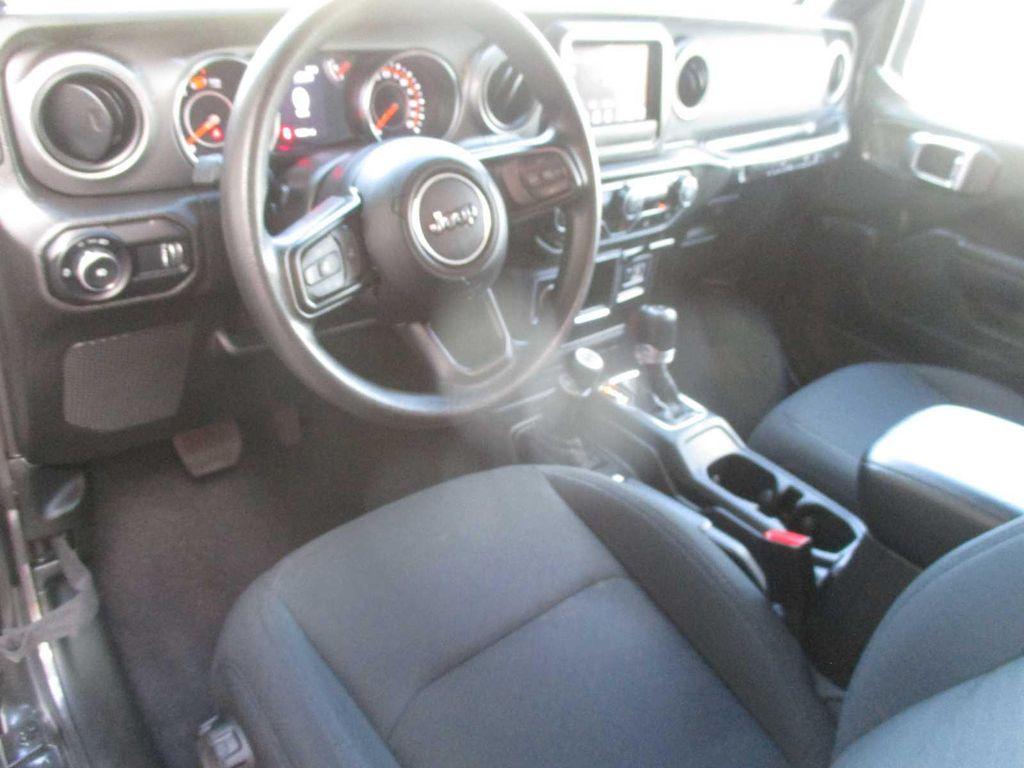 used 2023 Jeep Wrangler car, priced at $27,968