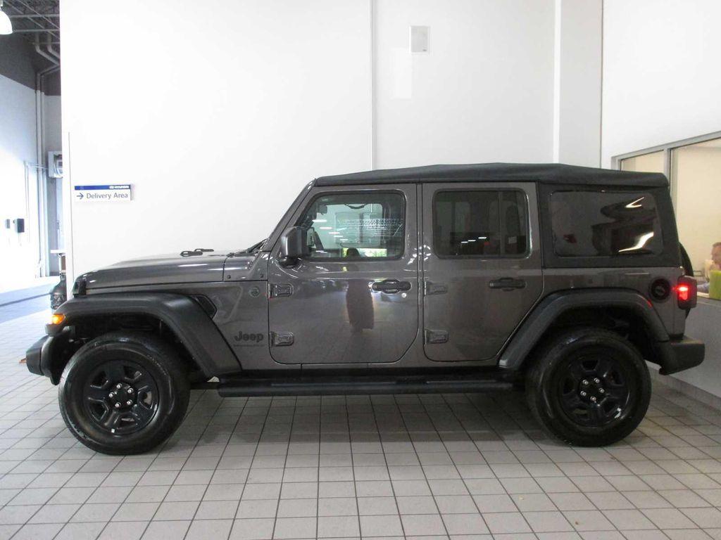 used 2023 Jeep Wrangler car, priced at $27,968