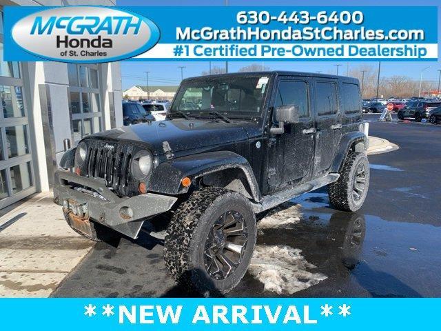 used 2013 Jeep Wrangler Unlimited car, priced at $14,295