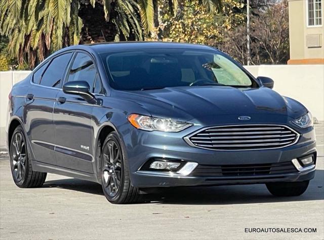 used 2018 Ford Fusion Hybrid car, priced at $15,999