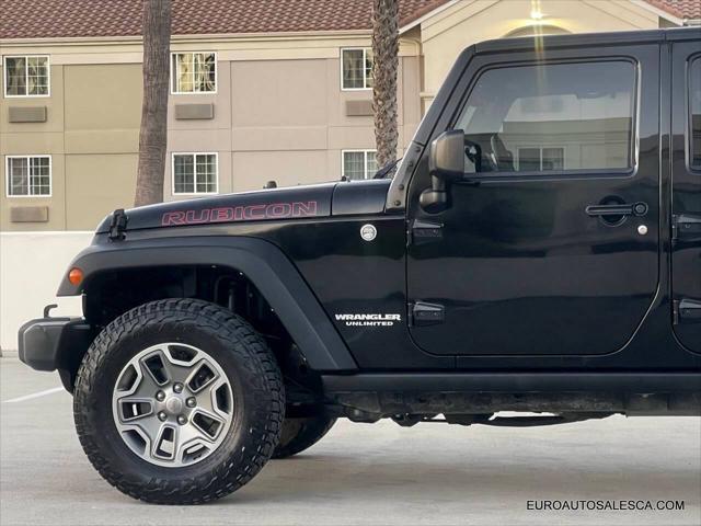 used 2014 Jeep Wrangler Unlimited car, priced at $23,888