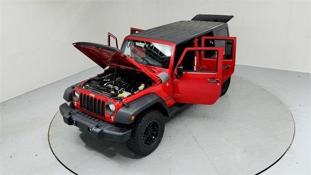 used 2014 Jeep Wrangler Unlimited car, priced at $13,895