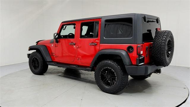 used 2014 Jeep Wrangler Unlimited car, priced at $13,895