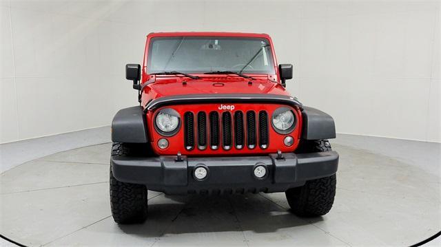 used 2014 Jeep Wrangler Unlimited car, priced at $13,895