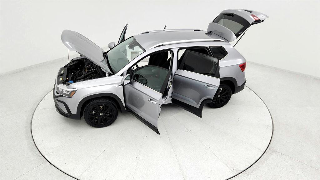 used 2023 Volkswagen Taos car, priced at $20,295