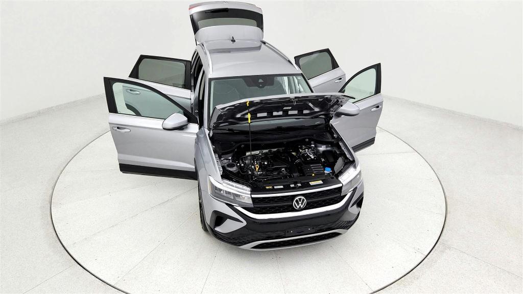 used 2023 Volkswagen Taos car, priced at $20,295