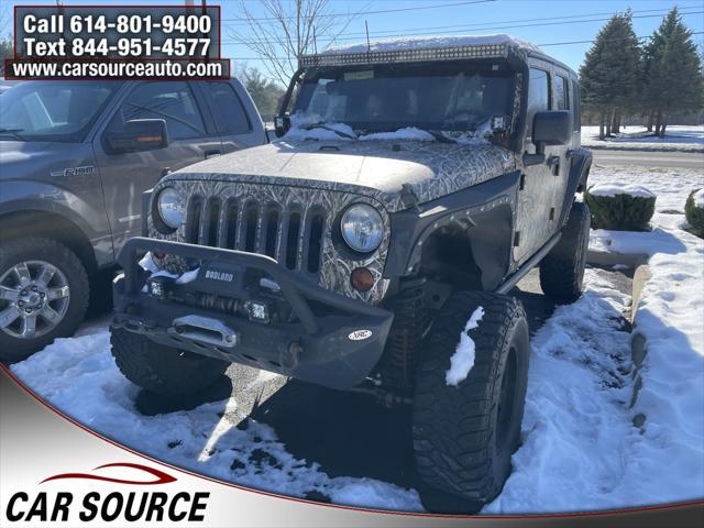 used 2012 Jeep Wrangler Unlimited car, priced at $8,450