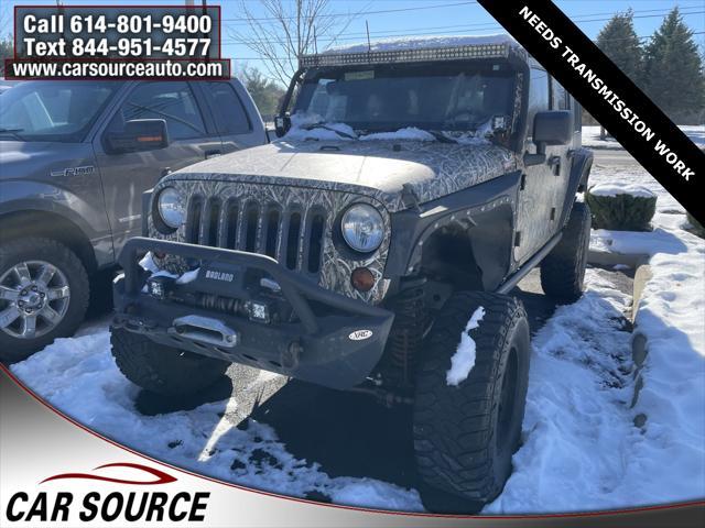 used 2012 Jeep Wrangler Unlimited car, priced at $7,550