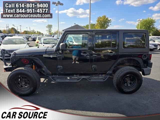 used 2012 Jeep Wrangler Unlimited car, priced at $11,995