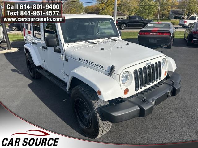 used 2012 Jeep Wrangler Unlimited car, priced at $13,450