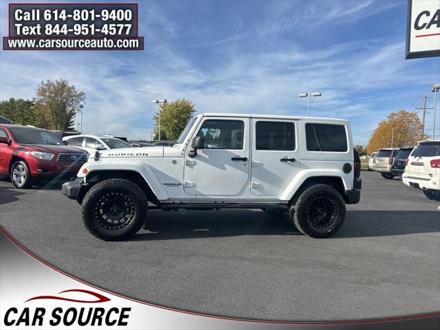 used 2012 Jeep Wrangler Unlimited car, priced at $13,450