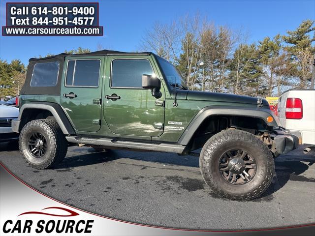 used 2011 Jeep Wrangler Unlimited car, priced at $13,450