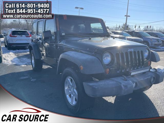 used 2011 Jeep Wrangler Unlimited car, priced at $7,995